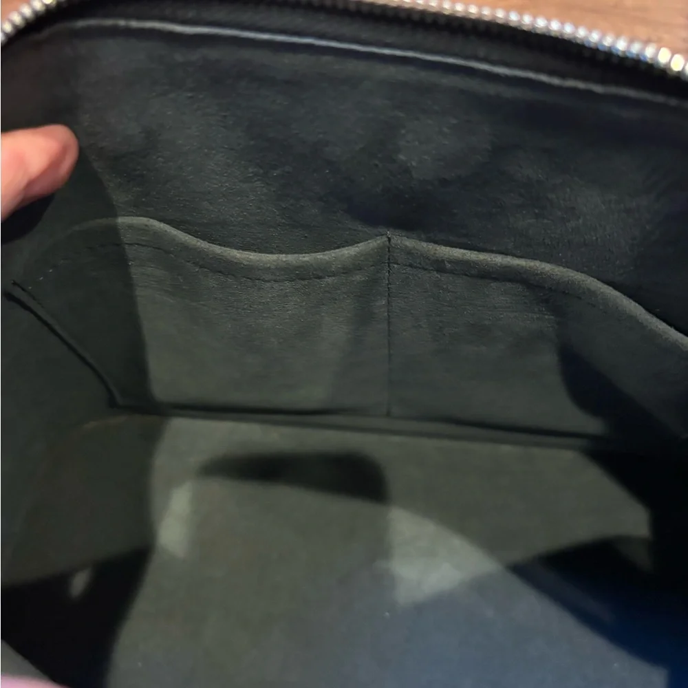 Louis Vuitton Alma Black Epi Leather Handbag.Authenticity
Guaranteed by Poshmark - Picture 7 of 10